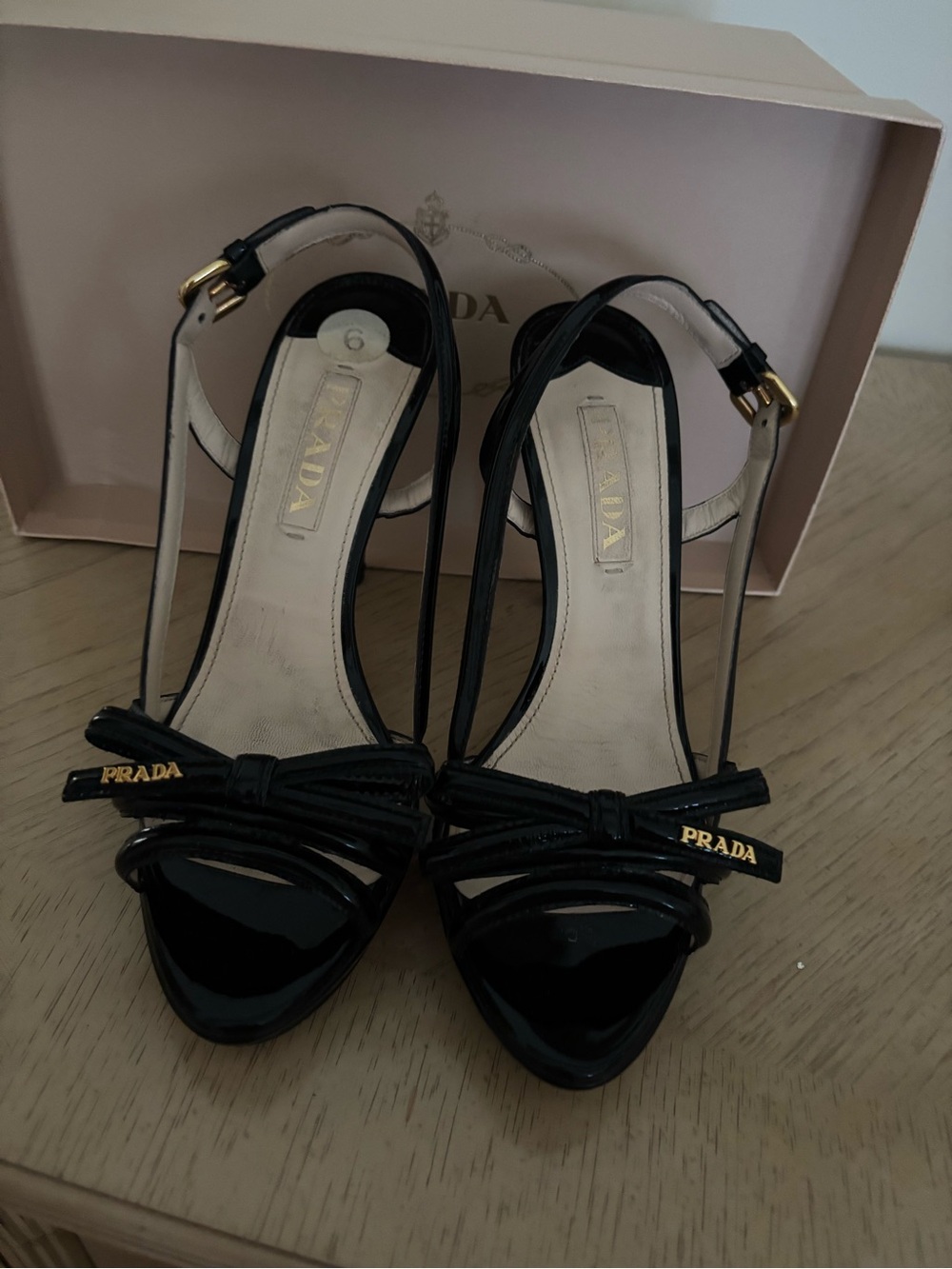 Prada Black Patent Leather T-Strap Bow Sandals with Gold Logo
